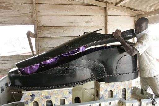 Image of a Ghanian fantasy coffin in the shape of a sneaker