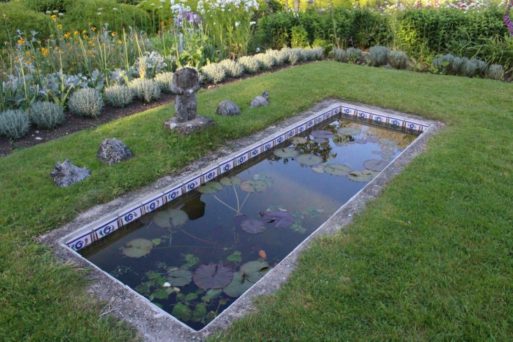 Image of Charleston's little pond, one of the art gardens in East Sussex