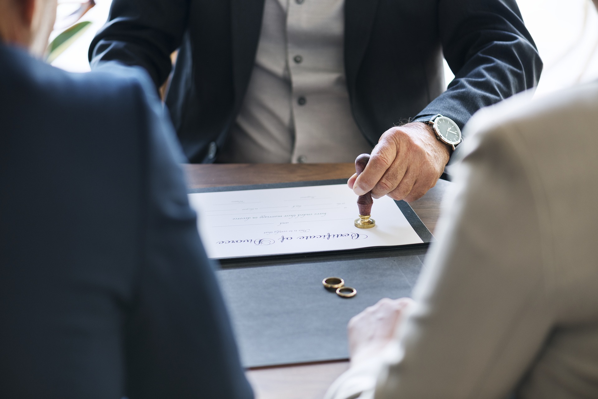 Lawyer stamping a divorce certificate