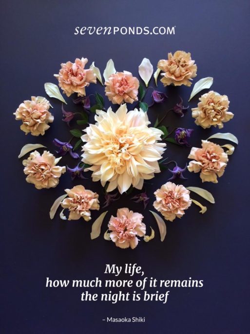 a handmade heart of flowers with a haiku below from SevenPonds