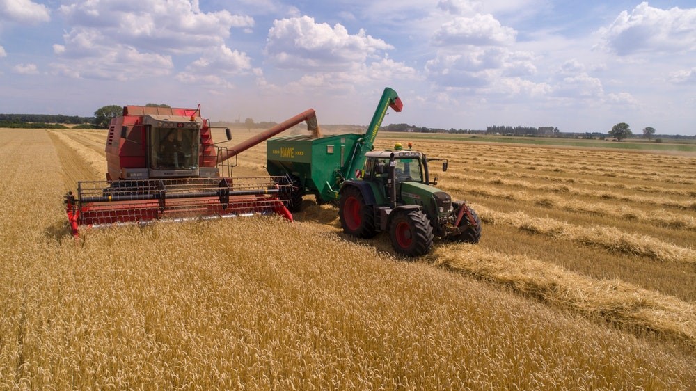 an image of tractor in a field representing the faulty CDC study on farmers and suicide