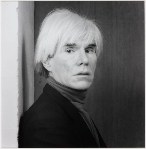 Black and white portrait of Andy Warhol