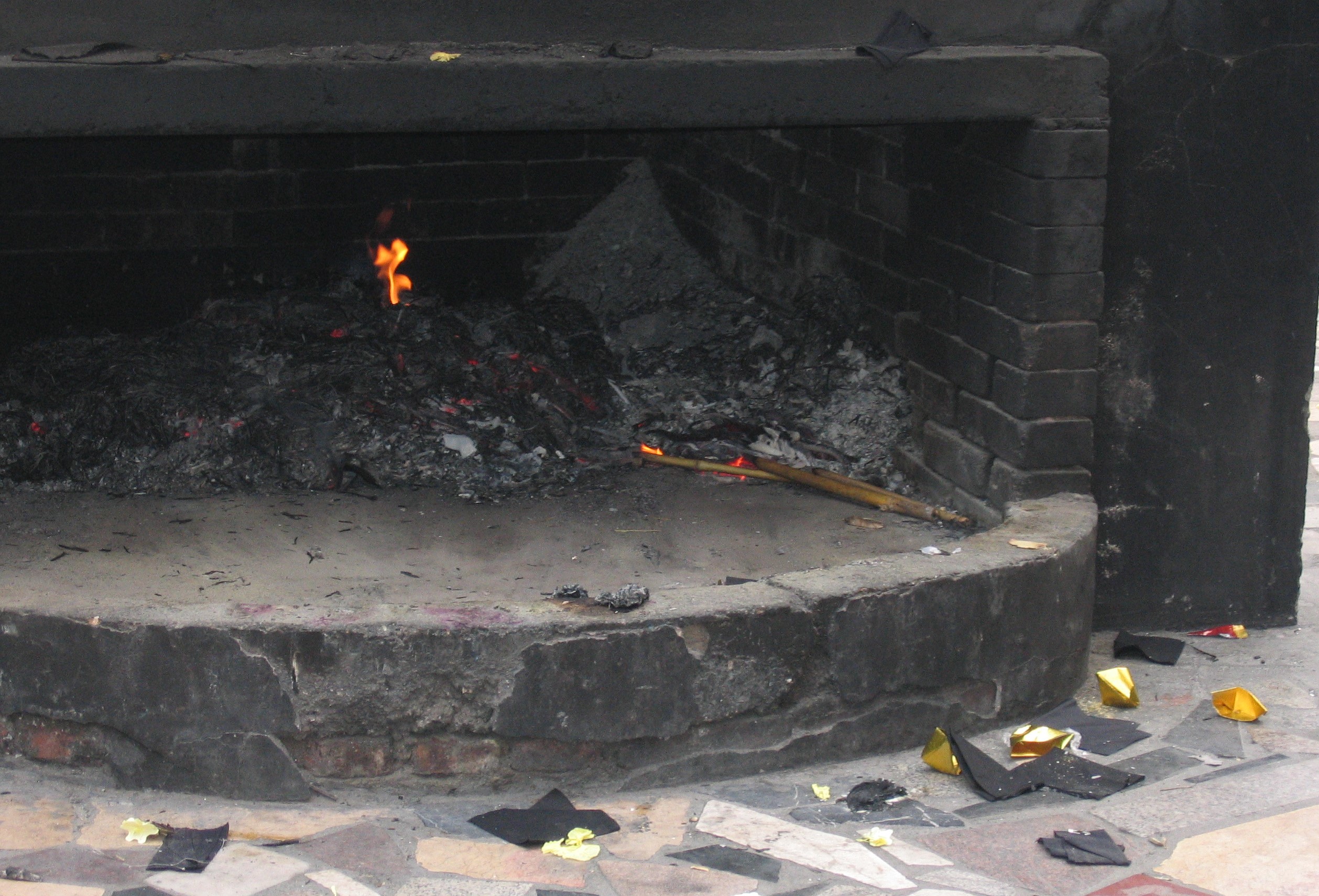 An image of a fire offering as part of Chinese Funeral Tradition