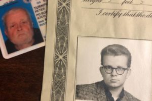 One identification card of Peter Turnpu as a young man and one of him as an elderly man.