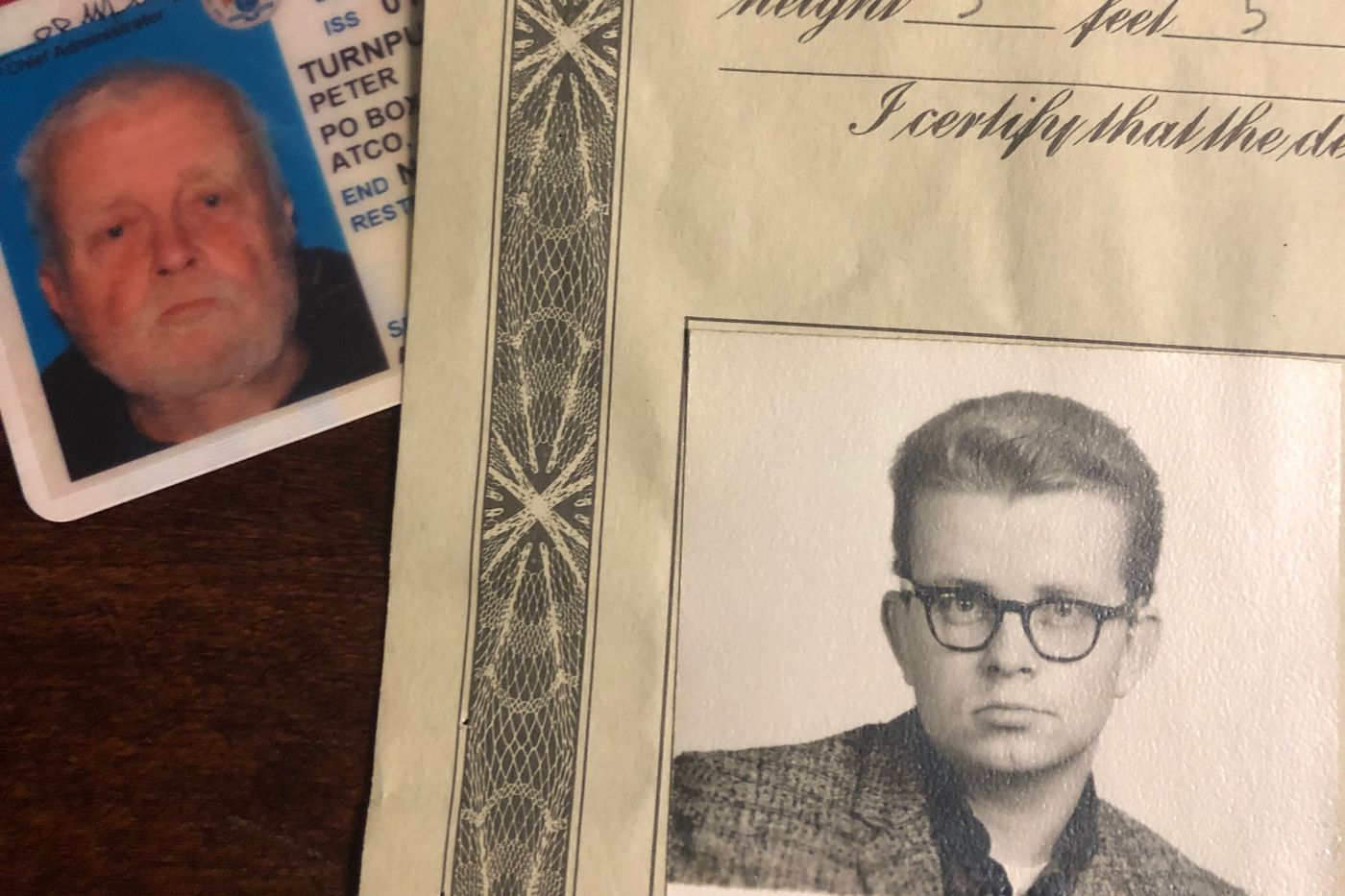 One identification card of Peter Turnpu as a young man and one of him as an elderly man.