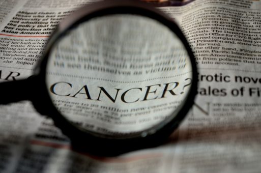 An image of a newspaper showing cancer rates 