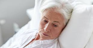 Woman with dementia in a memory care unit