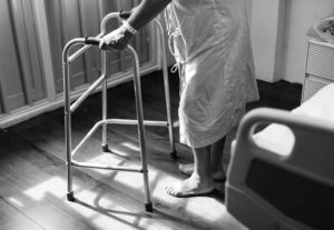 A person with a walker shows that frailty often affects older adults and makes them moe prone to Alzheimer's dementia