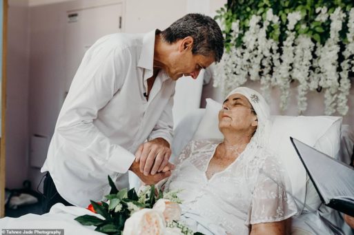 Colin and Tracey MacDonald holding hands during their wedding shortly before her death from lung cancer