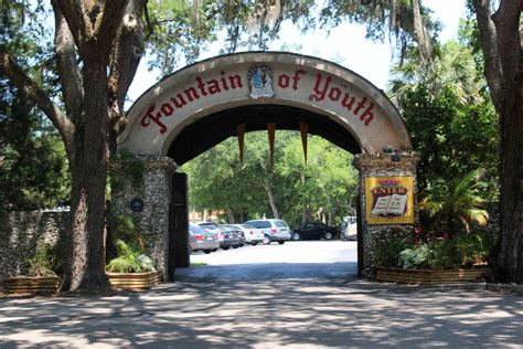Entryway into a parking lot that reads "Fountain of Youth."