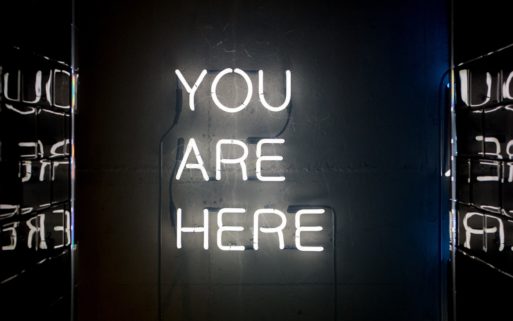 image of "you are here" sign symbolizes quote by omar khayyam