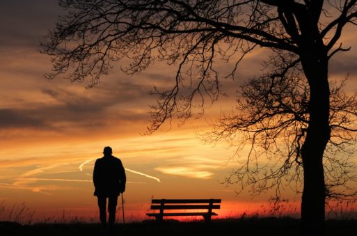 An elderly LGBT person alone looking at sunset have a shortened lifespan