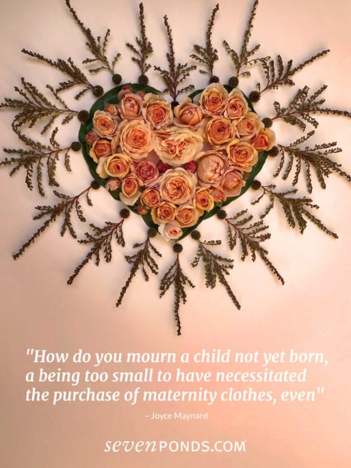 handmade heart made of flowers and a quote about miscarriage and grief