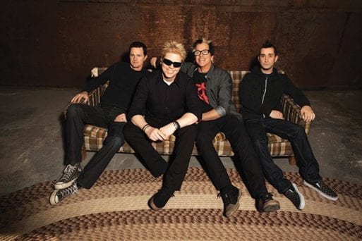 The Offspring band, who sing "Gone Away" sitting on a couch.