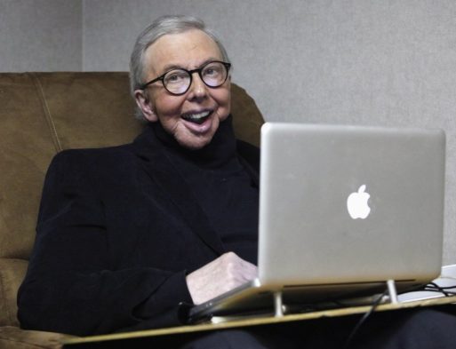 Roger Ebert writing on his computer after cancer surgery