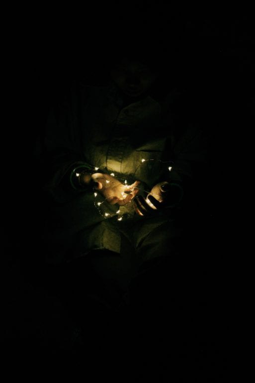 Image of person holding lights symbolizing a New Heart 