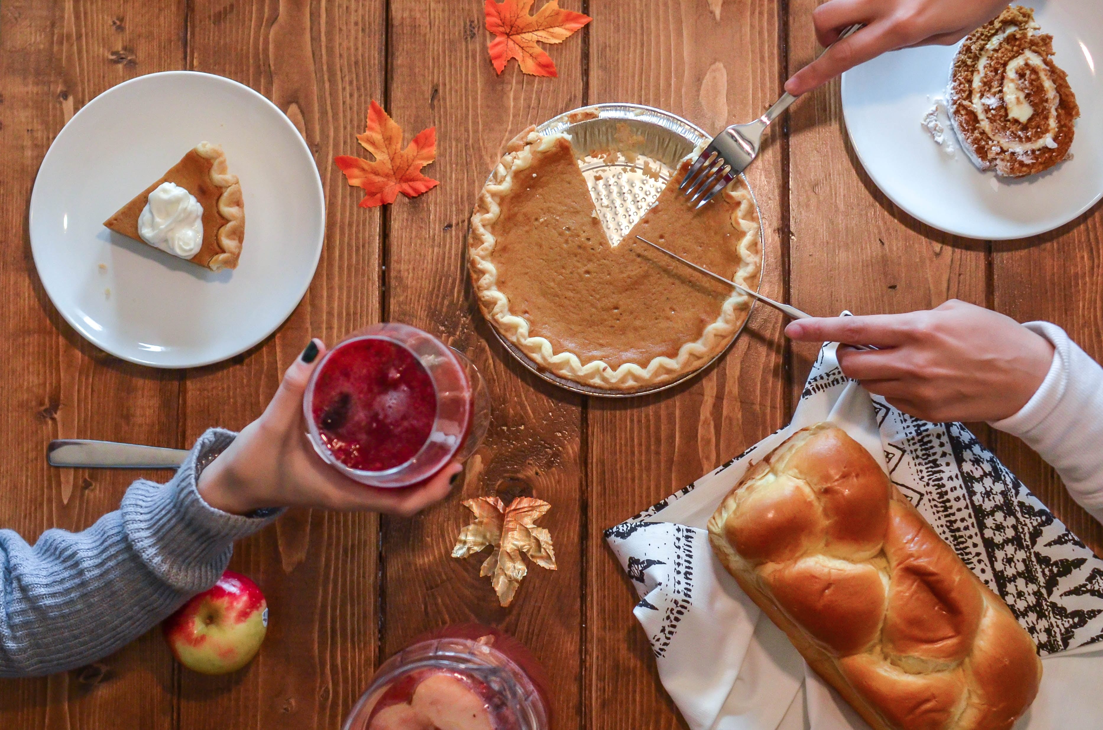 A table covered with traditional Thanksgiving food