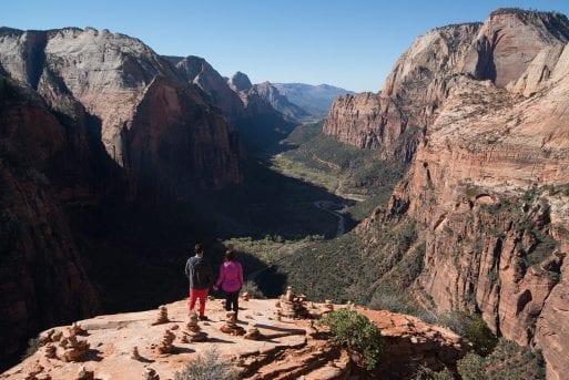 Image of people scattering cremation ashes at angel's landing in Zion national park