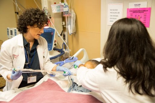 Dr. Jessica Nutik Zitter works with a patient to enhance comfort and minimize the trauma of code blues and other patient deaths.