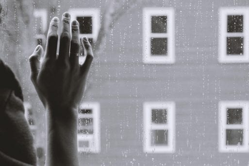 Image of a hand on window symbolizing the Fernando Pessoa Poem 44 [167]