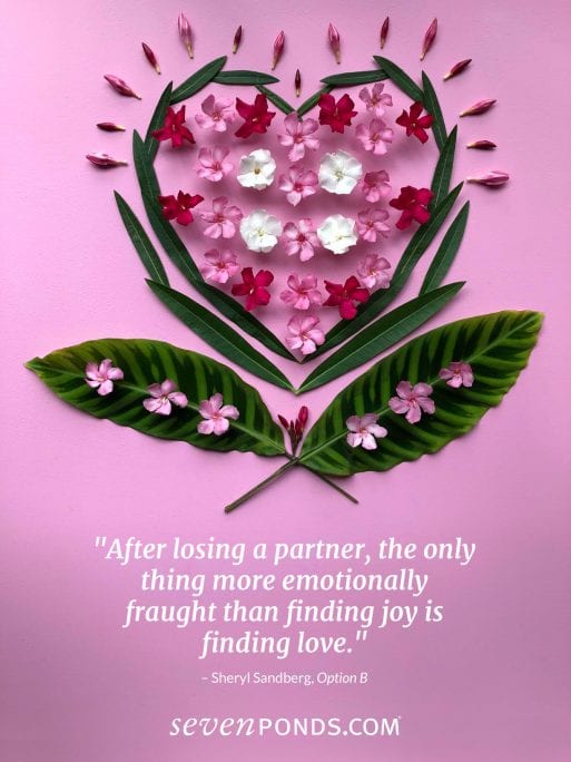 A pink heart made of flowers and a quote about finding love after loss