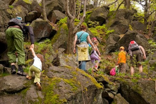 family hiking for a celebration of life in an unusual location