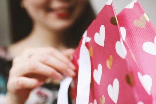 girl opens gift from friend who died