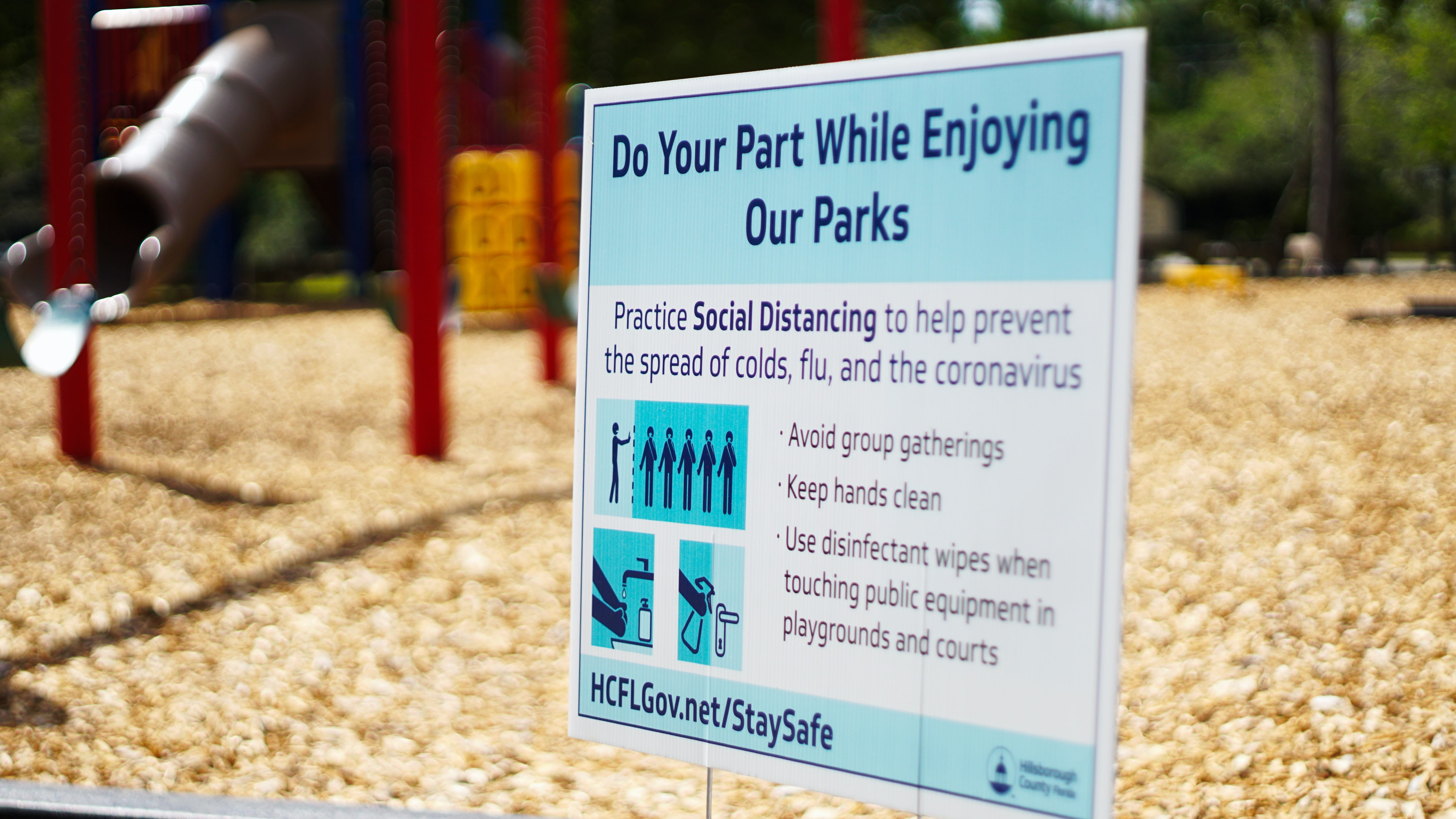 image of sign to maintain social distancing as part of the plan to loosen stay-at-home restrictions