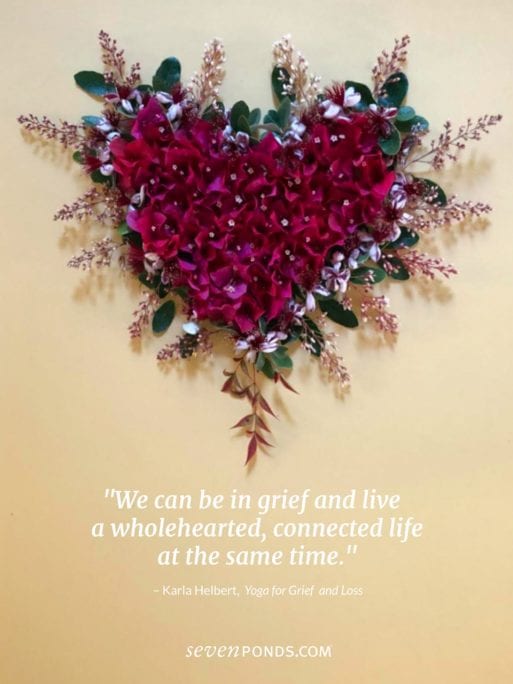 Heart made of flowers with quote about grief