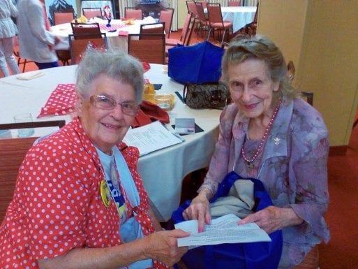 Mae Krier poses with a friend at the American Rosie the Riveter Association convention.