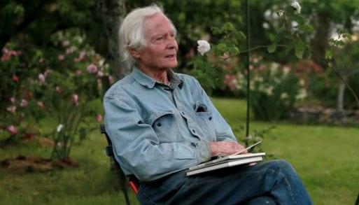 Poet W.S. Merwin, who wrote the poem "Thanks," in a garden.