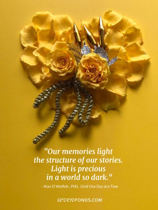 A heart made of yellow flowers and quote about grief