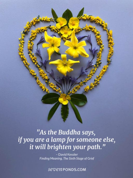 heart made of yellow flowers and a quote from the buddha