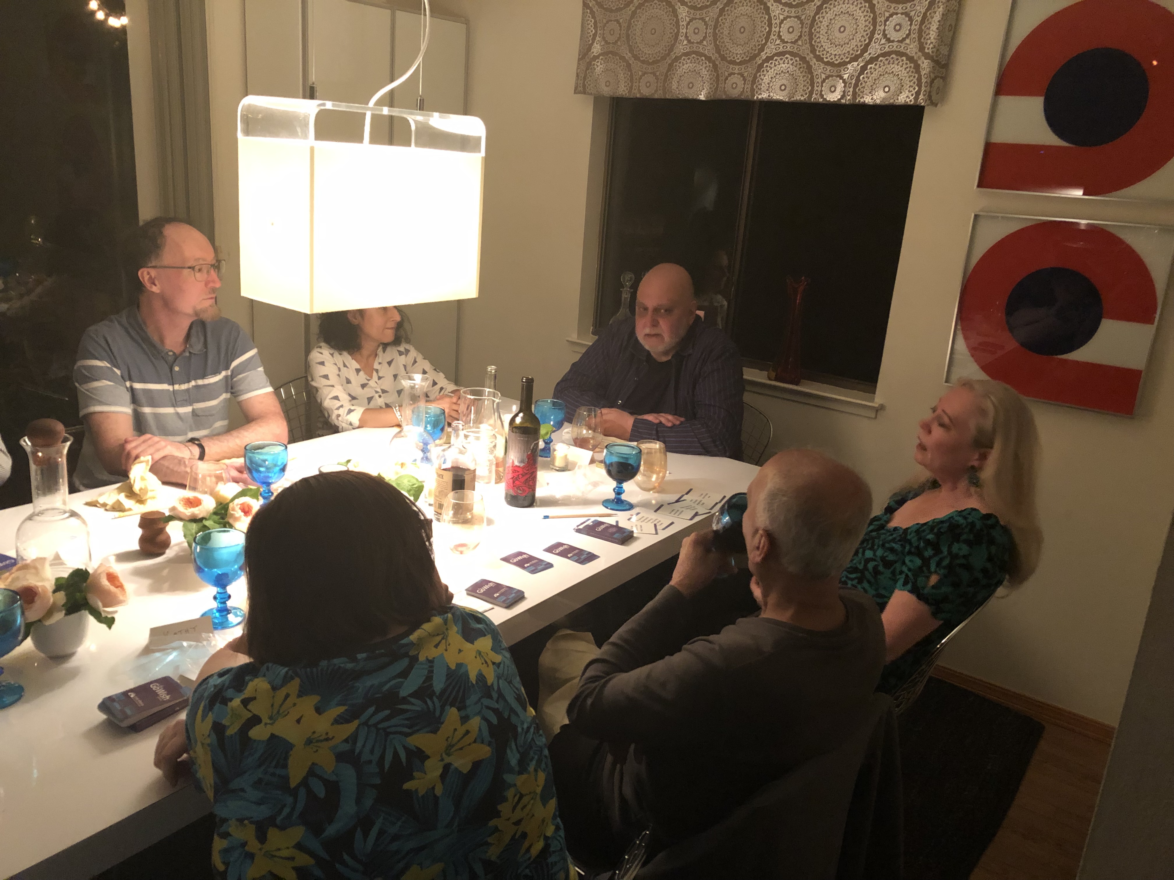 image of baby boomers talking about rational suicide around while playing a card game 