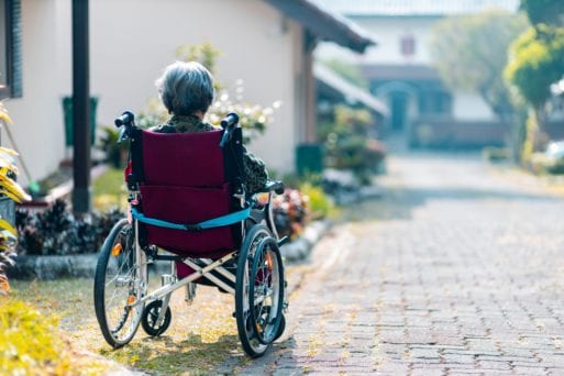 image of woman in a wheelchair in a nursing home symbolizing dementia and rational suicide