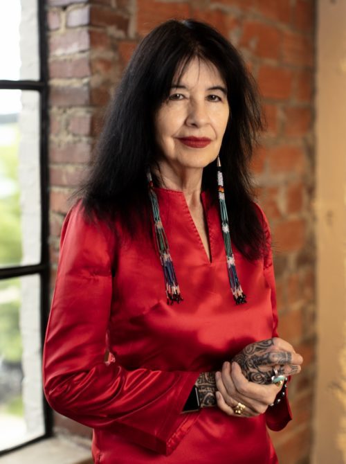 joy harjo in a red silk shirt