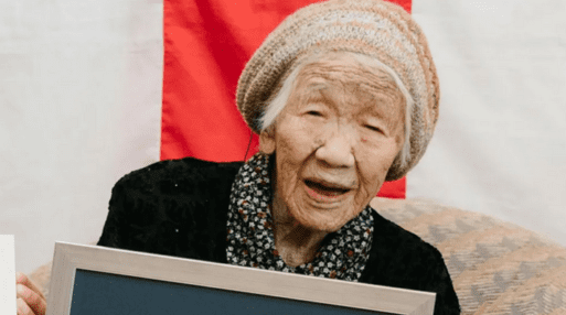 Kane Tanaka, the oldest person in the world, looks into the camera.