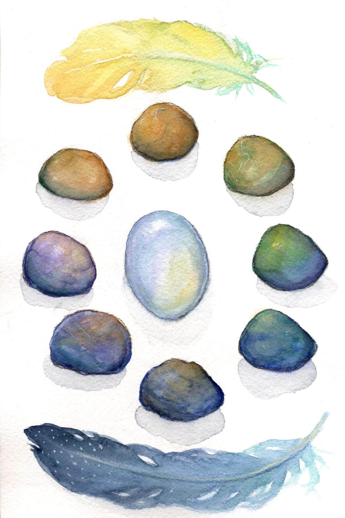 A collection of stones and feathers provides a way, like the grief cards, for carrying loss.
