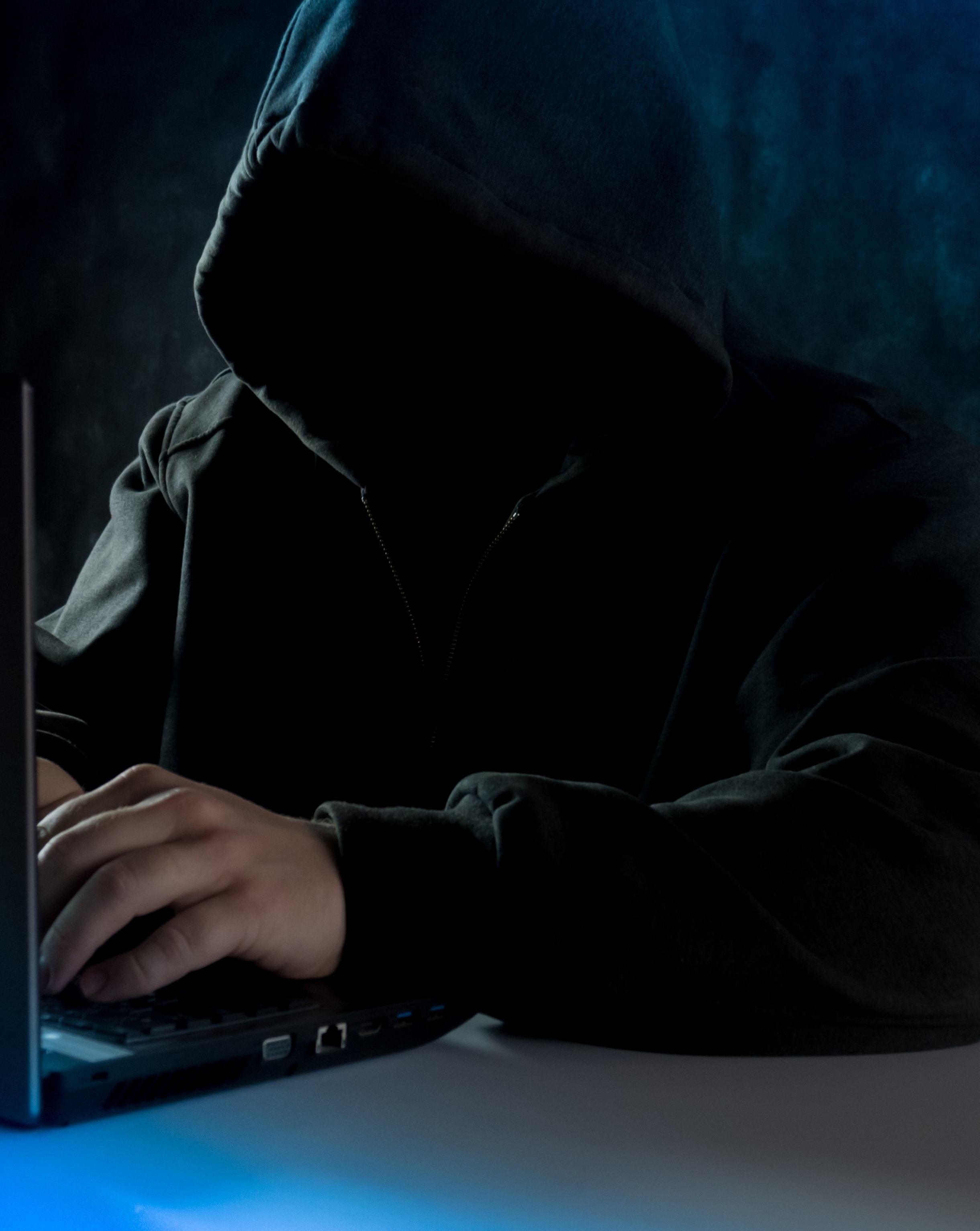 hooded hacker funeral scam