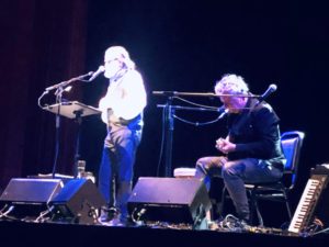 Jenkinson and Hoskins performing onstage at the Night of Grief and Mystery
