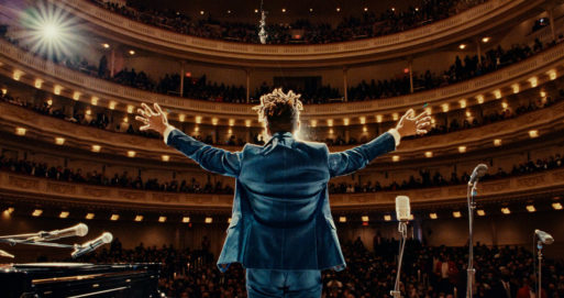 A scene from "American Symphony" with Jon Batiste leading an orchestra