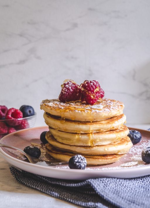pancakes and berries make a delicious addition to a breakfast basket