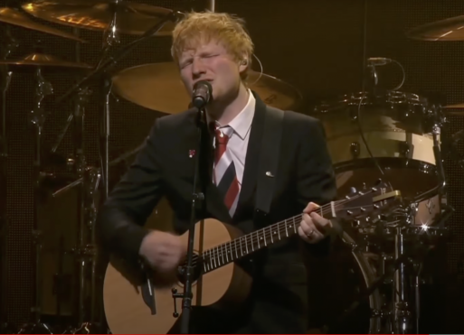 Ed Sheeran singing "Visiting Hours" at a memorial service