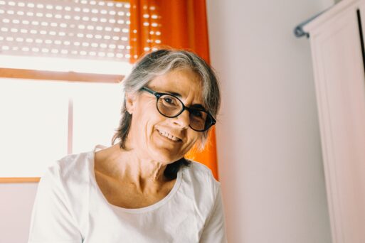 smiling older woman shows a good attitude