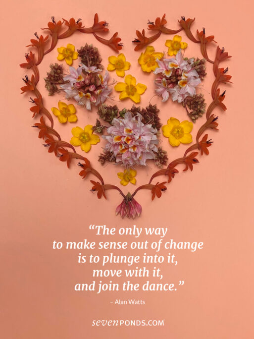 heart made of flowers on orange background with quote from Alan Watts