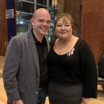 Murphy poses with a friend and colleague in the deathcare space.