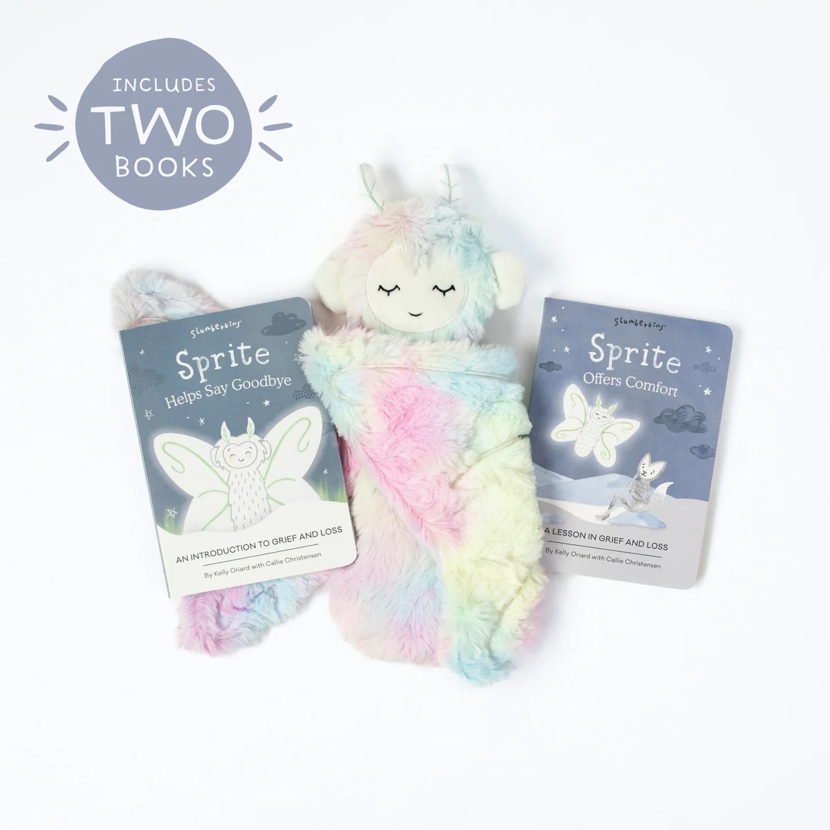 A snuggly winged toy with two books