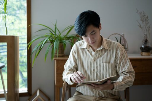 Man holding an end of life planner in his home