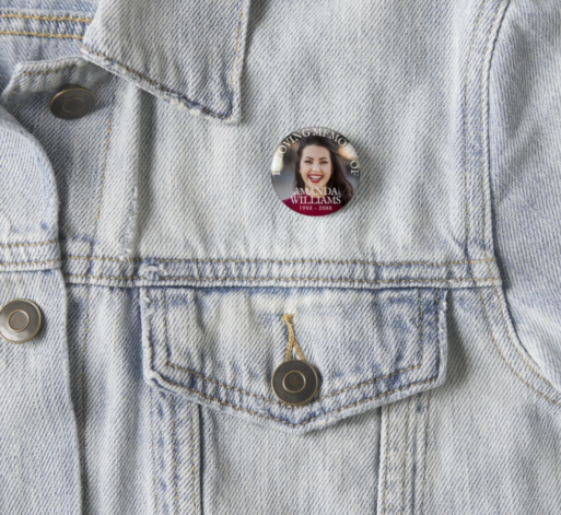 Memorial pin with smiling young woman on a shirt.
