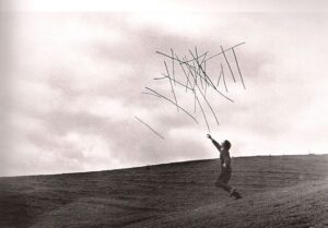 Man tossing sticks as inspiration for a memorial service